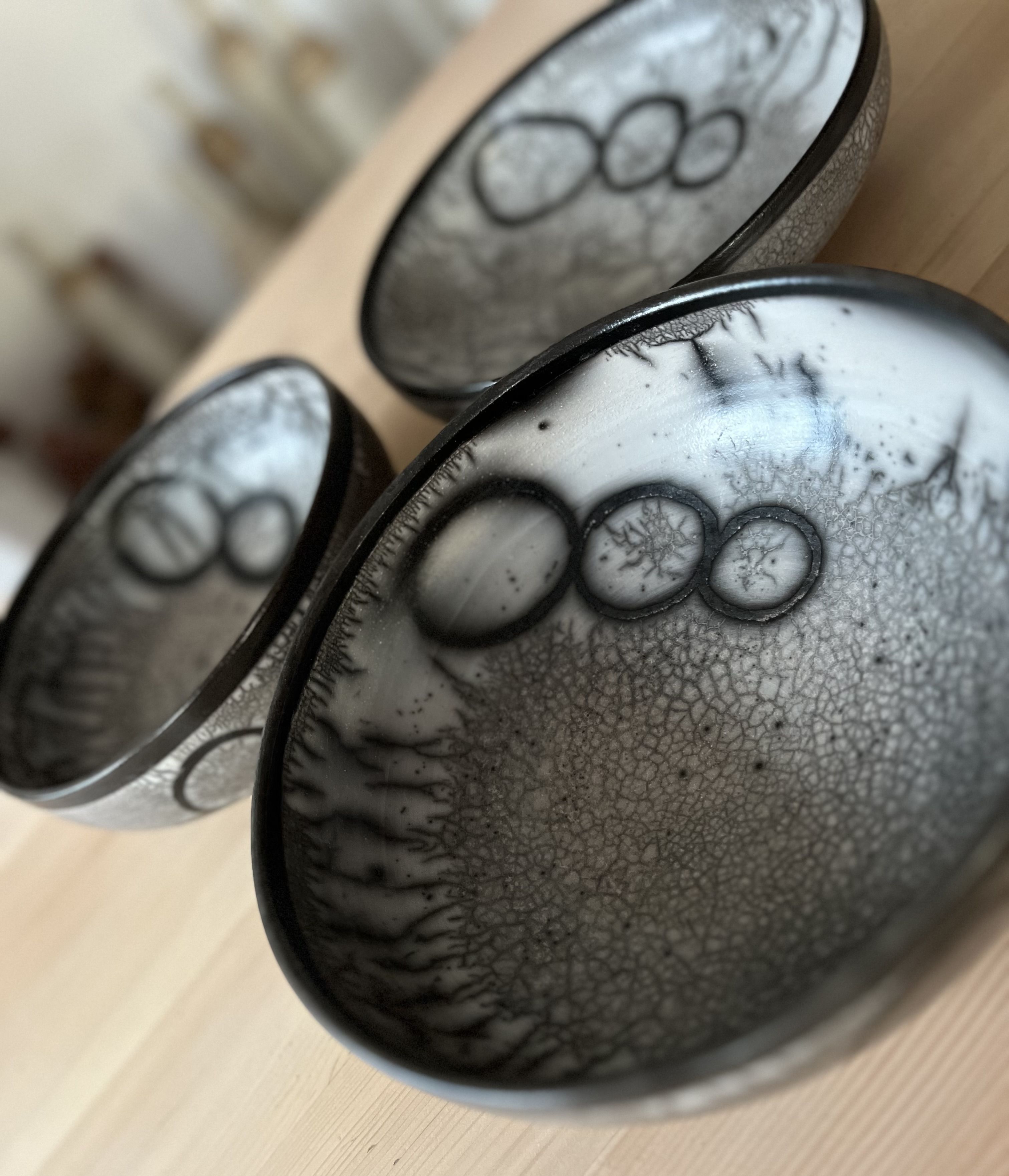 1 Raku black and white bowl with circle pattern  by Tamsin Levene