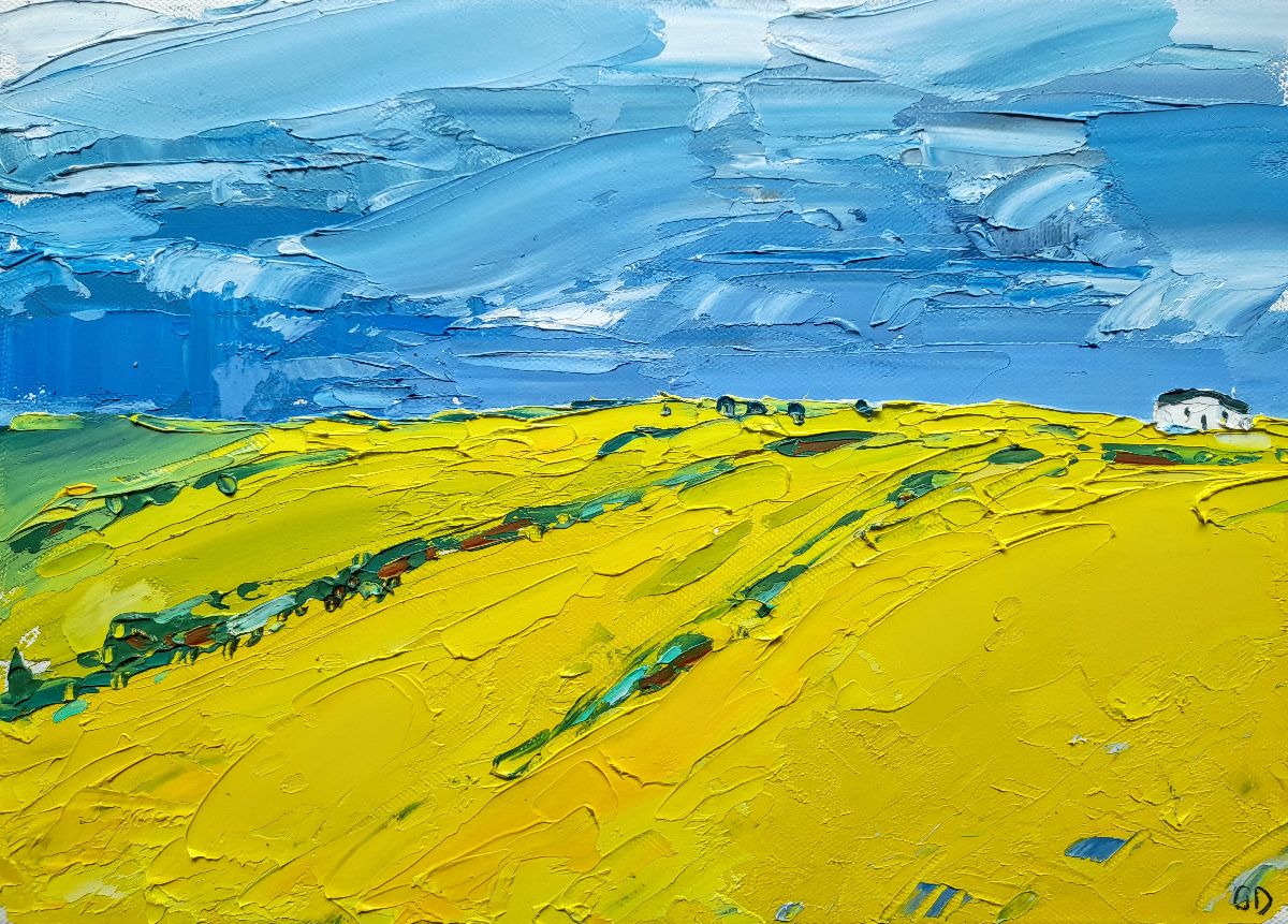 Stormy skies over yellow fields by Georgie Dowling