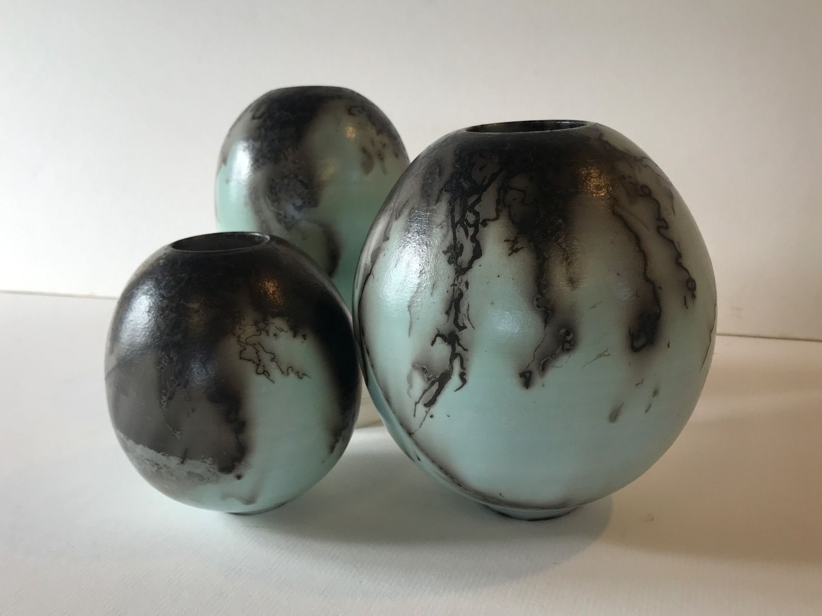 Three Duck Egg Blue Horse Hair Raku Ball Vases  by Tamsin Levene