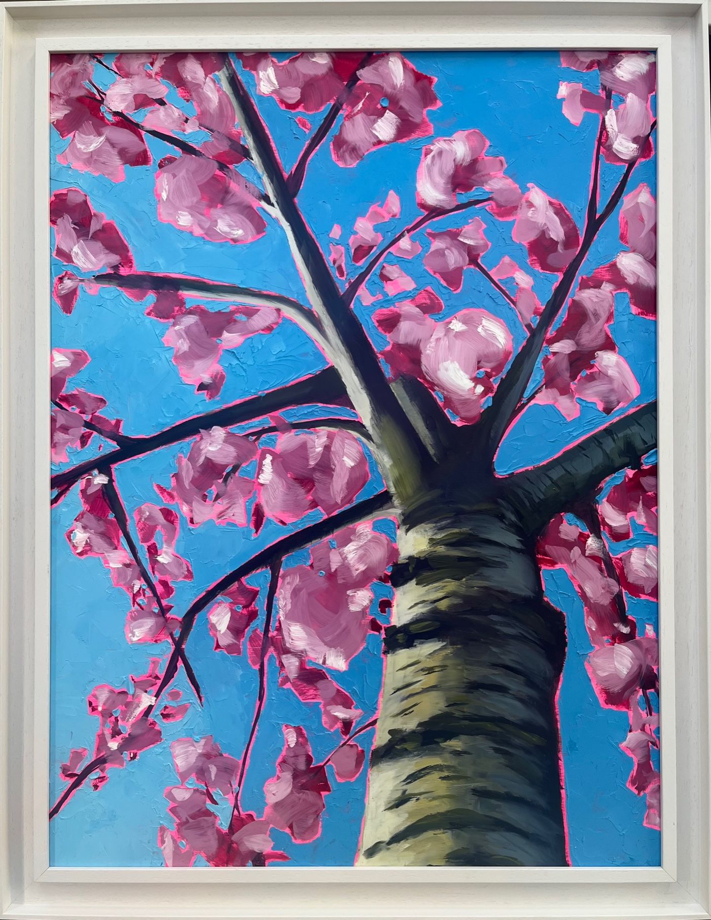 Looking up through a beautiful blossom for strength by Emily Finch