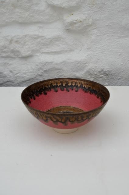 Matte pink, white footed bowl by Peter Wills